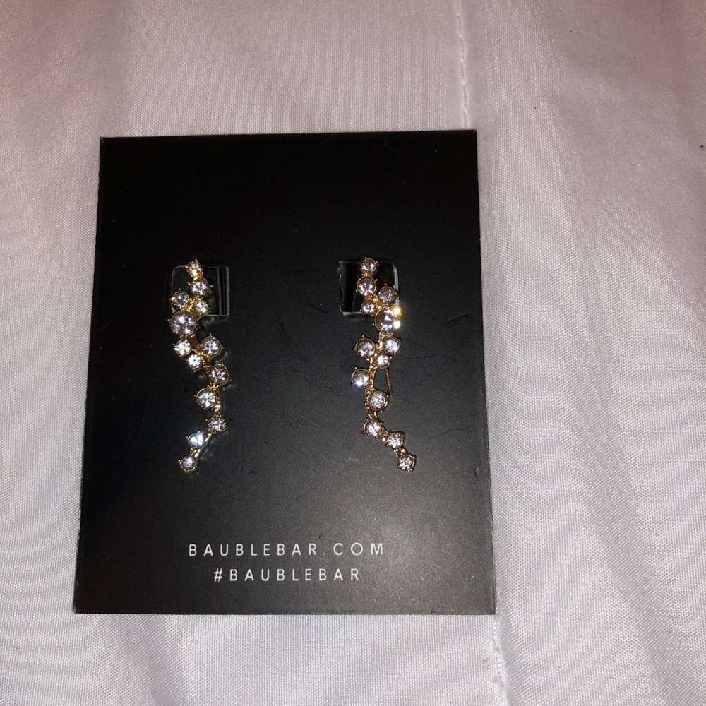 Brand new never worn Earrings/ crawler